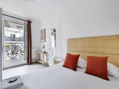 Un ou plusieurs lits dans un hébergement de l'établissement Charming flat - 1BDR 2P Rue Saint Maur