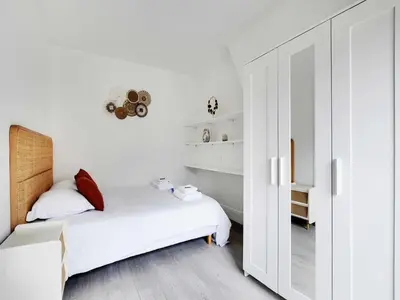 Un ou plusieurs lits dans un hébergement de l'établissement Charming flat - 1BDR 2P Rue Saint Maur