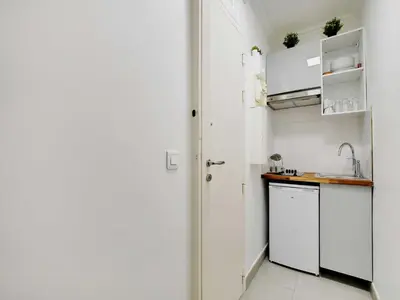 Cuisine ou kitchenette dans l'établissement Appt calm & cozy 1BDR 4P - Nation