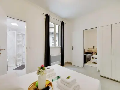 Un ou plusieurs lits dans un hébergement de l'établissement Appt calm & cozy 1BDR 4P - Nation