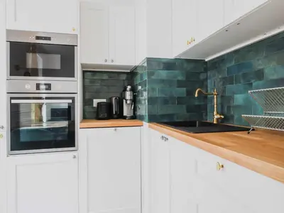 Cuisine ou kitchenette dans l'établissement Cosy flat - 1BD 2P - Montparnasse