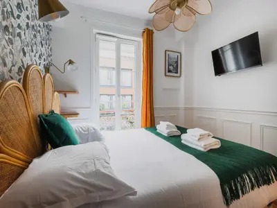 Un ou plusieurs lits dans un hébergement de l'établissement Cosy flat - 1BD 2P - Montparnasse