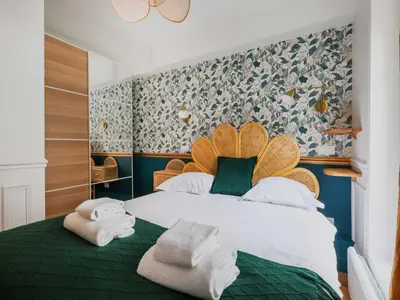 Un ou plusieurs lits dans un hébergement de l'établissement Cosy flat - 1BD 2P - Montparnasse