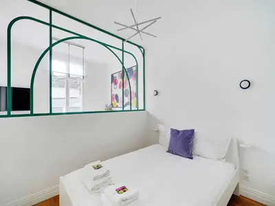 Un ou plusieurs lits dans un hébergement de l'établissement Charming flat 1BDR 2P - Ternes NIEL