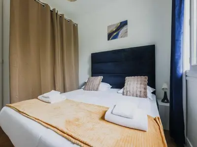 Un ou plusieurs lits dans un hébergement de l'établissement Charming apartment -1BR-2P- Boulogne-Billancourt