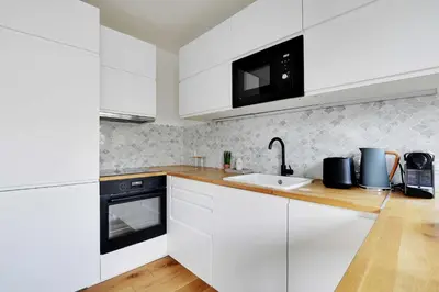 Cuisine ou kitchenette dans l'établissement Modern flat 2P in the heart of MARAIS