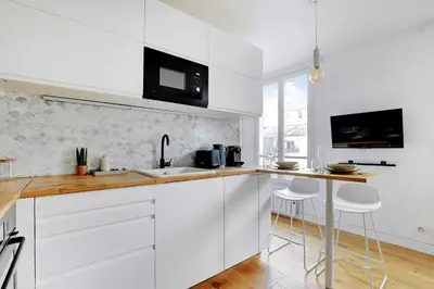 Cuisine ou kitchenette dans l'établissement Modern flat 2P in the heart of MARAIS