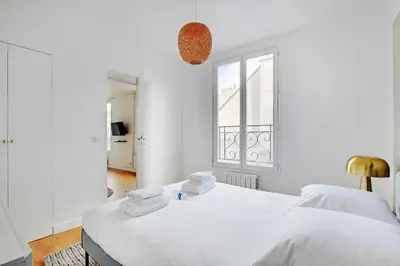 Un ou plusieurs lits dans un hébergement de l'établissement Modern flat 2P in the heart of MARAIS