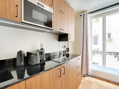 Cuisine ou kitchenette dans l'établissement Cozy Studio - 2P - Montparnasse Luxembourg