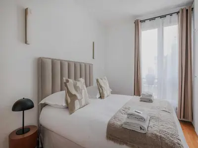 Un ou plusieurs lits dans un hébergement de l'établissement Parisian charm Elegant 1-bedroom apt