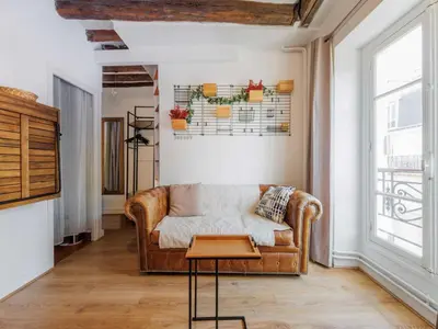 Coin salon dans l'établissement Studio COSY near Invalides - 2P