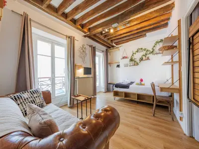 Coin salon dans l'établissement Studio COSY near Invalides - 2P