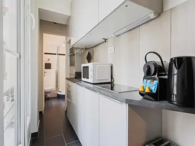 Cuisine ou kitchenette dans l'établissement Studio Cosy -2P - Moulin Rouge