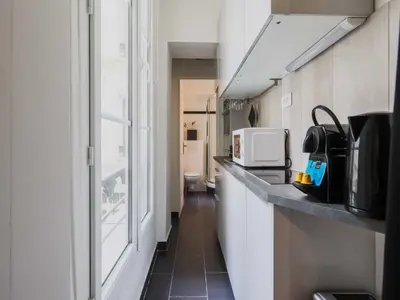 Cuisine ou kitchenette dans l'établissement Studio Cosy -2P - Moulin Rouge