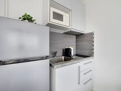 Cuisine ou kitchenette dans l'établissement Bright studio with balcony - 2P- Eiffel Tower view
