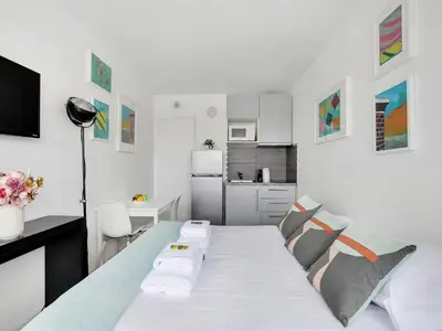 Cuisine ou kitchenette dans l'établissement Bright studio with balcony - 2P- Eiffel Tower view