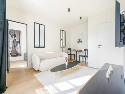 Coin salon dans l'établissement Charming apt - Canal Saint-Martin - Mobility lease
