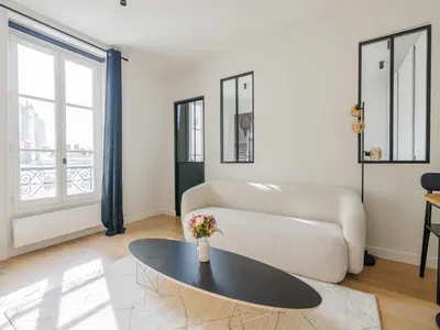 Un ou plusieurs lits dans un hébergement de l'établissement Charming apt - Canal Saint-Martin - Mobility lease