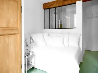Un ou plusieurs lits dans un hébergement de l'établissement Studio COSY - 2P- Hôtel de Ville, le Marais