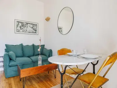 Coin salon dans l'établissement Charming apartment near Bois de Vincennes - 1BDR 2P