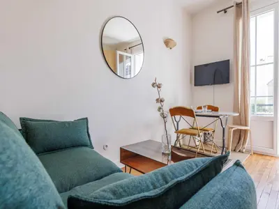 Télévision ou salle de divertissement dans l'établissement Charming apartment near Bois de Vincennes - 1BDR 2P