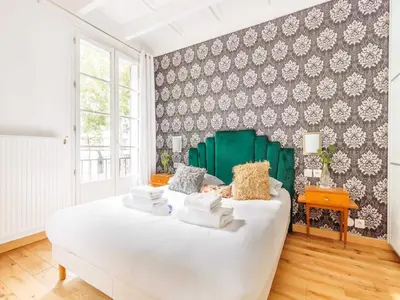 Un ou plusieurs lits dans un hébergement de l'établissement Superb apartment - 2 BDR 4 P - Pont de Grenelle