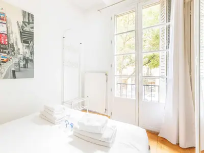 Un ou plusieurs lits dans un hébergement de l'établissement Superb apartment - 2 BDR 4 P - Pont de Grenelle