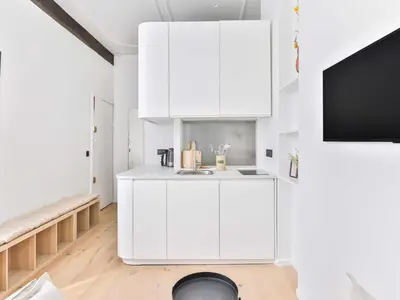Cuisine ou kitchenette dans l'établissement Cosy Studio 2P Odeon Saint Michel