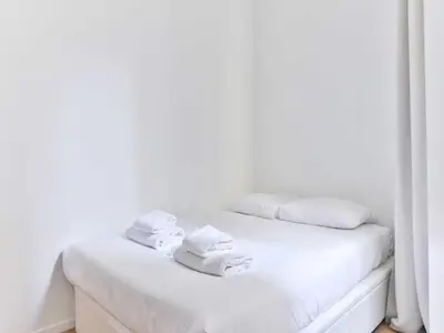 Un ou plusieurs lits dans un hébergement de l'établissement Cosy Studio 2P Odeon Saint Michel