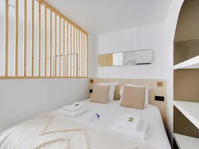 Un ou plusieurs lits dans un hébergement de l'établissement Lovely studio 2P - PASSY - Mobility Lease