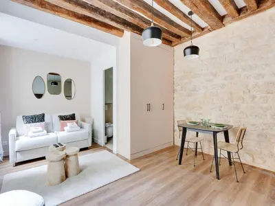 Coin salon dans l'établissement Magnificent Cocoon in the heart of Marais