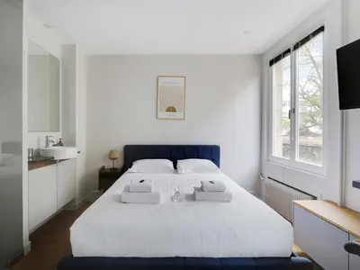 Un ou plusieurs lits dans un hébergement de l'établissement Charming studio - Neuilly-sur-Seine - Mobility lease