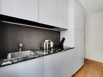 Cuisine ou kitchenette dans l'établissement Charming studio - Neuilly-sur-Seine - Mobility lease