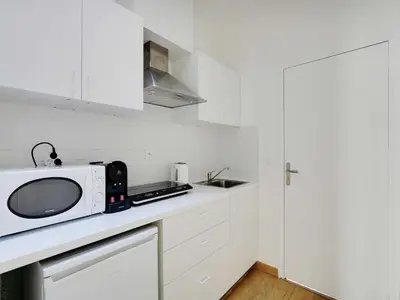 Cuisine ou kitchenette dans l'établissement Spacious Studio - 2P - Levallois-Perret
