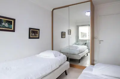 Un ou plusieurs lits dans un hébergement de l'établissement T3 apartment in the heart of La Villette
