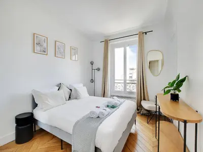 Un ou plusieurs lits dans un hébergement de l'établissement Very nice appt 1 BDR 2P- VOLTAIRE CHARONNE