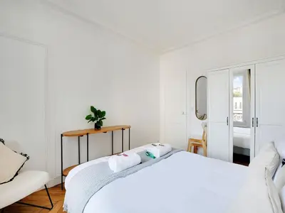 Un ou plusieurs lits dans un hébergement de l'établissement Very nice appt 1 BDR 2P- VOLTAIRE CHARONNE