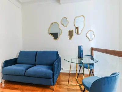 Coin salon dans l'établissement Superb souplex apt 2P - Mairie de Neuilly