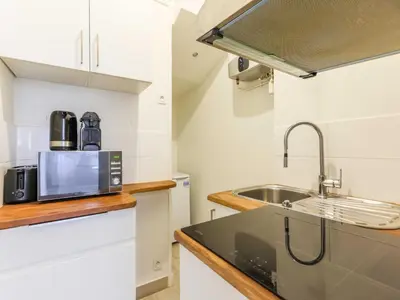 Cuisine ou kitchenette dans l'établissement Superb souplex apt 2P - Mairie de Neuilly