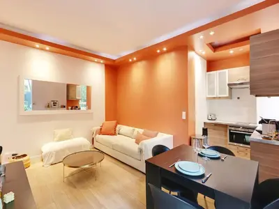 Cuisine ou kitchenette dans l'établissement Cosy flat with garden -Neuilly-sur-Seine