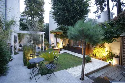 Jardin de l'établissement Villa du Square, Luxury Guest House