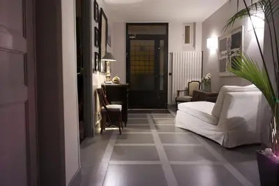 Un ou plusieurs lits dans un hébergement de l'établissement Villa du Square, Luxury Guest House