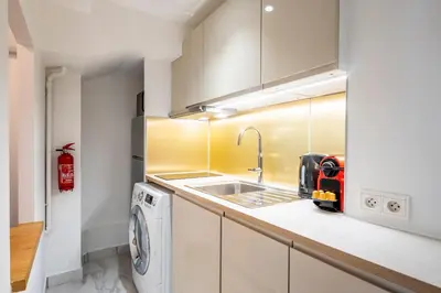 Cuisine ou kitchenette dans l'établissement HolidaysInParis - Bourg Tibourg
