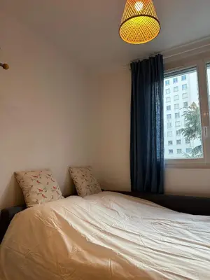 Un ou plusieurs lits dans un hébergement de l'établissement Apartment - 2 rooms - Malakoff