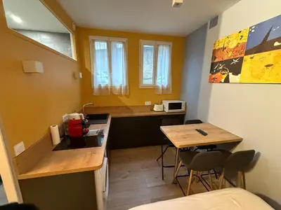 Cuisine ou kitchenette dans l'établissement Studio moderne proche Parc des Expos et Metro L12