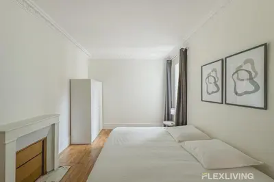 Un ou plusieurs lits dans un hébergement de l'établissement Flexliving - whole house - Hoche