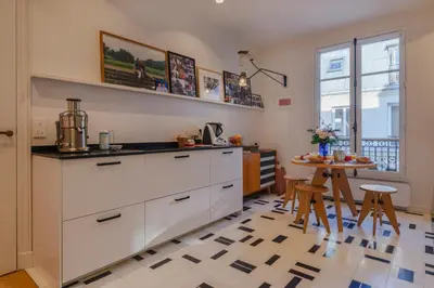 Cuisine ou kitchenette dans l'établissement Paris St Germain Loft residence