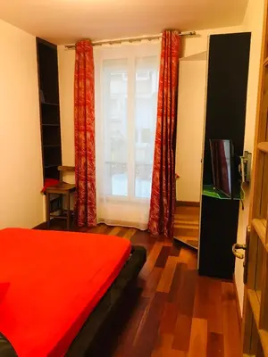 Un ou plusieurs lits dans un hébergement de l'établissement Abbesses Montmartre Apartment