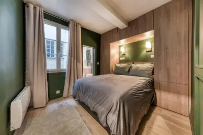 Un ou plusieurs lits dans un hébergement de l'établissement Renovated Apartment Saint-Germain-des-Prés - Le Bon Marché