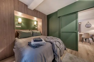 Un ou plusieurs lits dans un hébergement de l'établissement Renovated Apartment Saint-Germain-des-Prés - Le Bon Marché